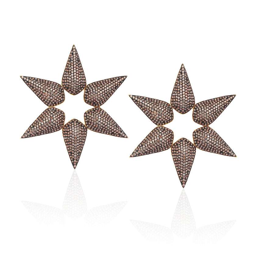 Cleofe Star Earrings in champagne color zirconia.