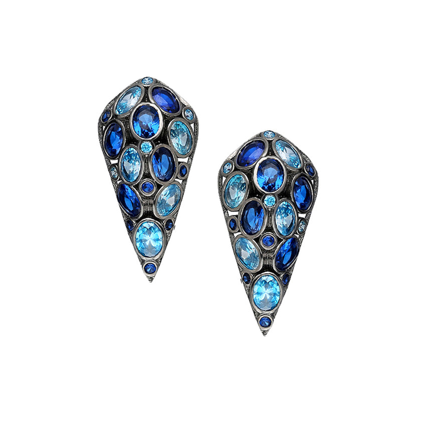 Delicate stud earrings, in the two tone blue color.