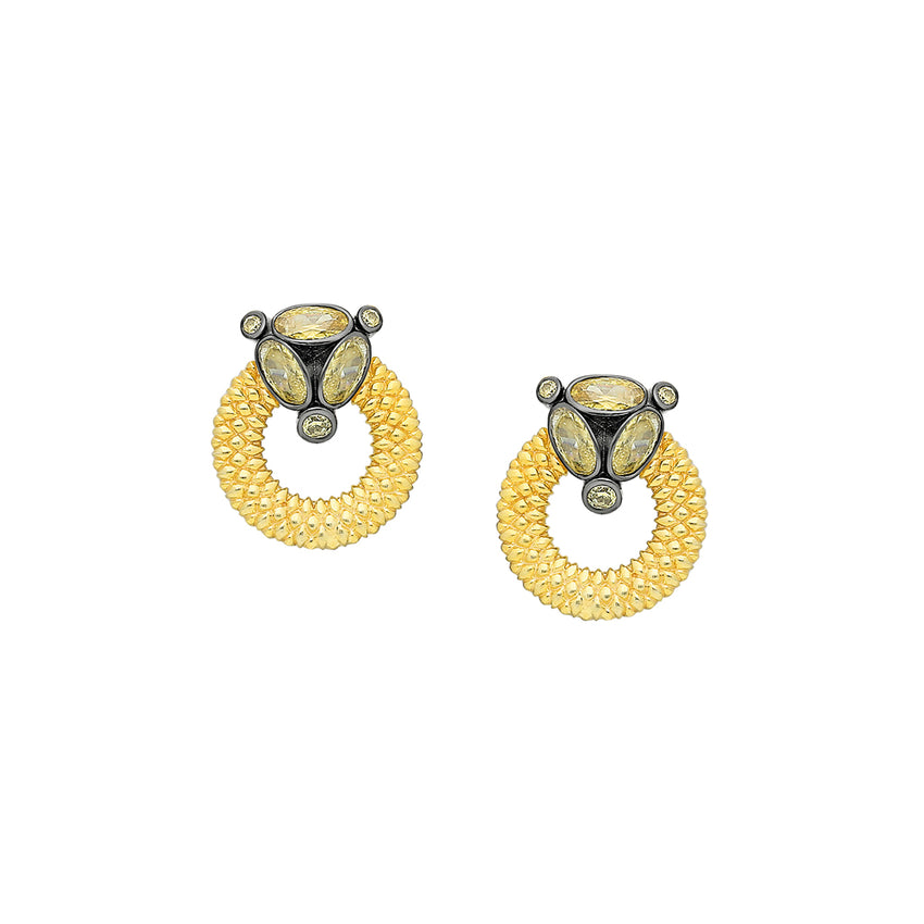 Gold stud earrings adorned with yellow gemstone.