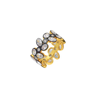 Gold ring embellished with gemstone.
