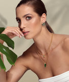 Adjustable double chain necklace adorned with green cultured Topaz stone.